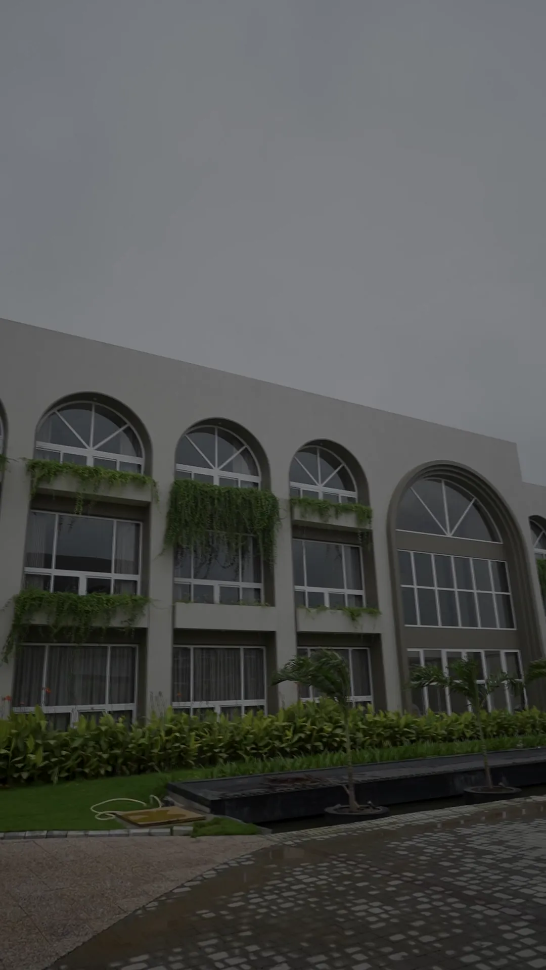 Clubhouse with Arched Glazing by Rudratech — uPVC installation detail 1
