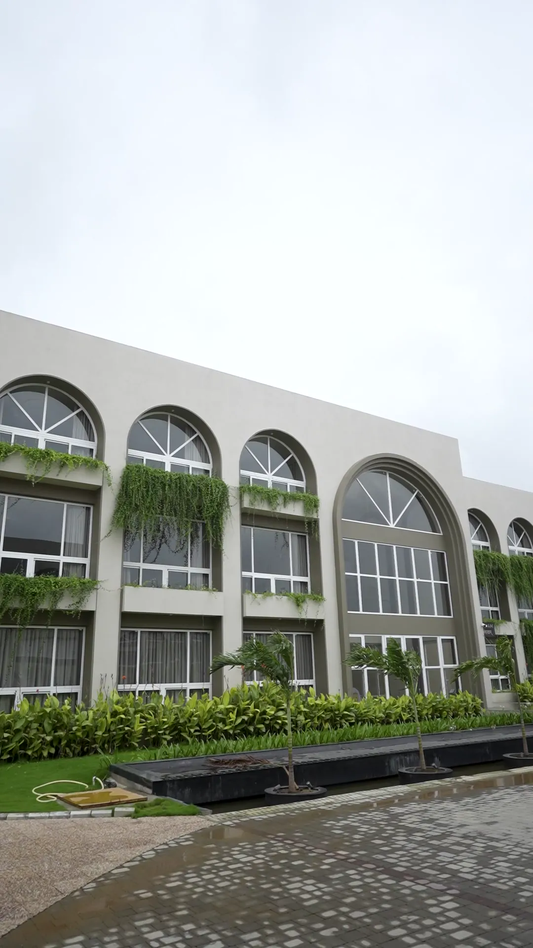 Clubhouse with Arched Glazing by Rudratech — uPVC installation detail 2