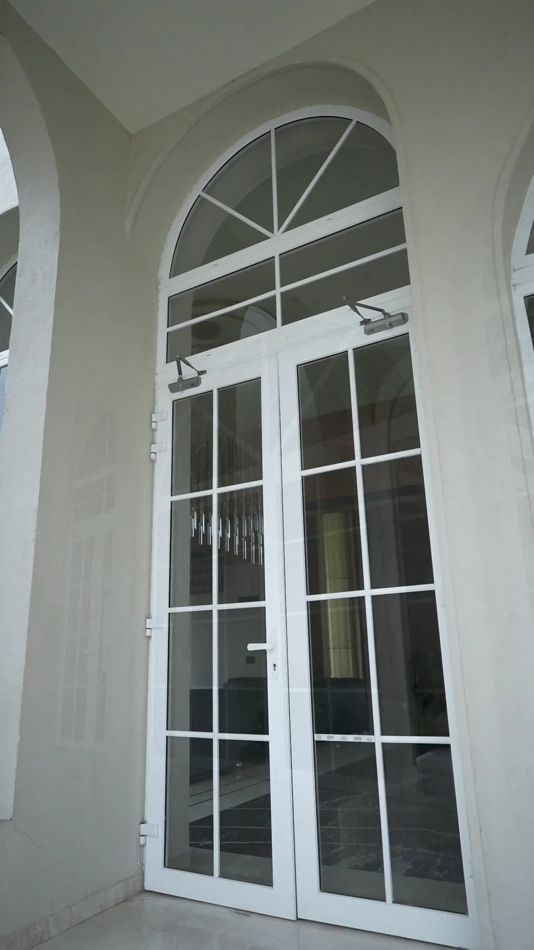 Clubhouse with Arched Glazing by Rudratech — uPVC installation detail 5