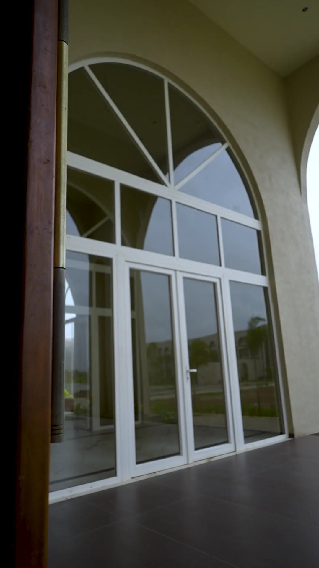 Clubhouse with Arched Glazing by Rudratech — uPVC installation detail 9