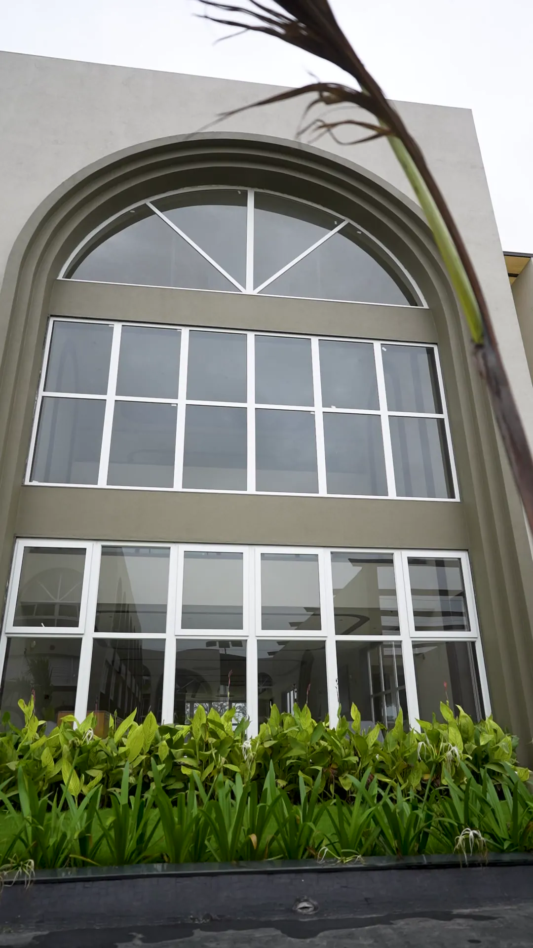 Clubhouse with Arched Glazing by Rudratech — uPVC installation detail 10