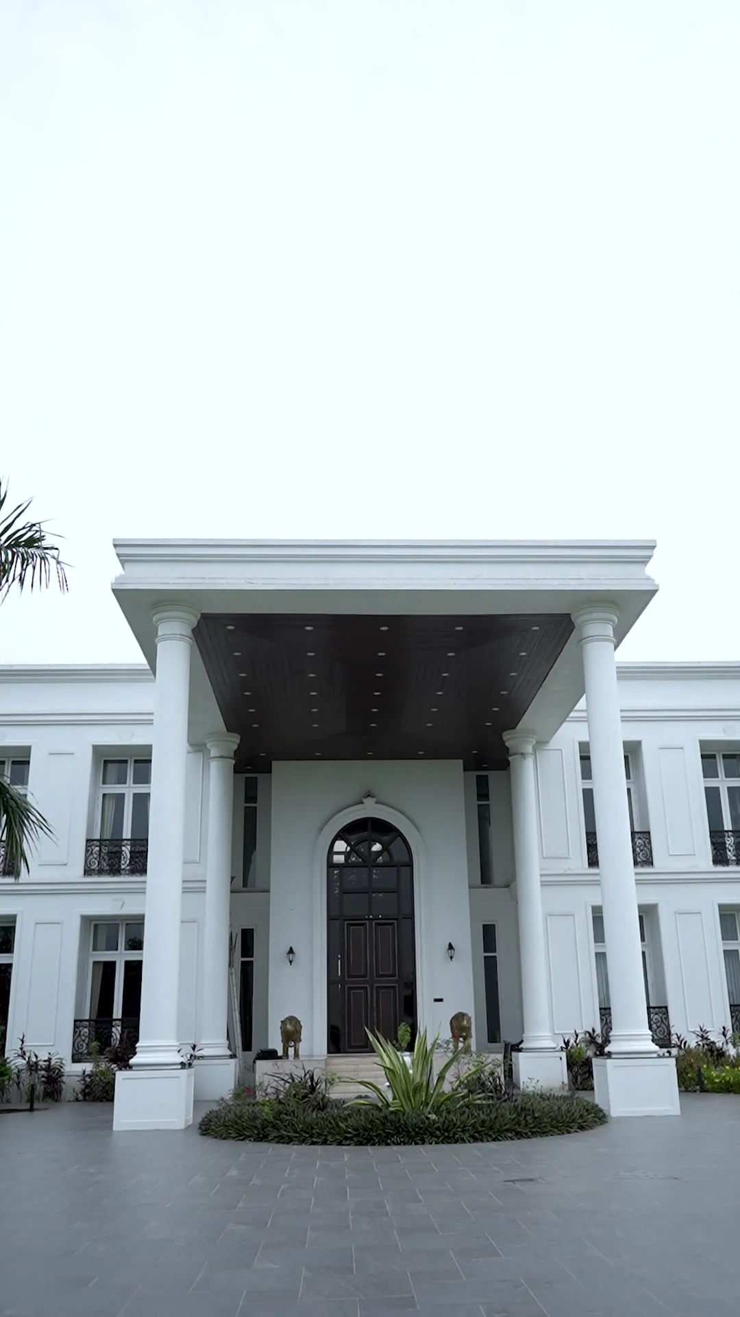 Luxury Villa with Arched Windows by Rudratech — uPVC installation detail 1