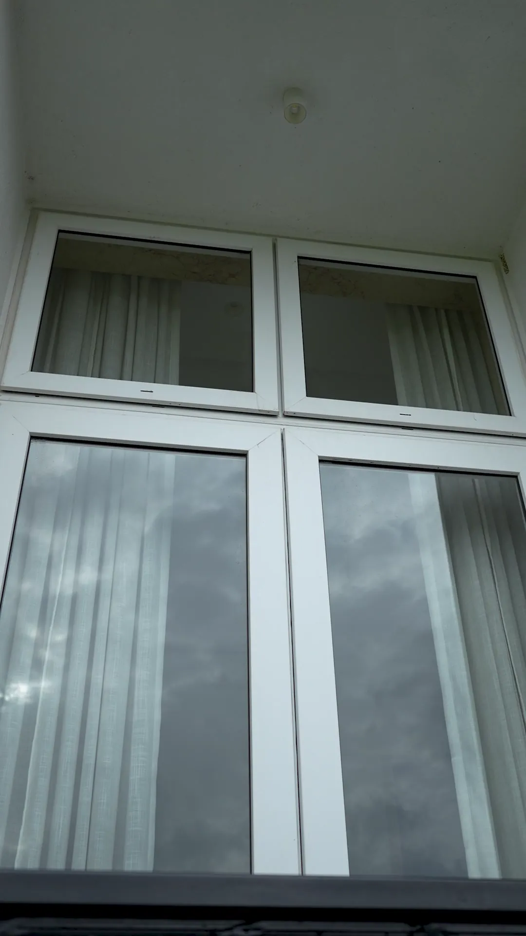 Luxury Villa with Arched Windows by Rudratech — uPVC installation detail 3