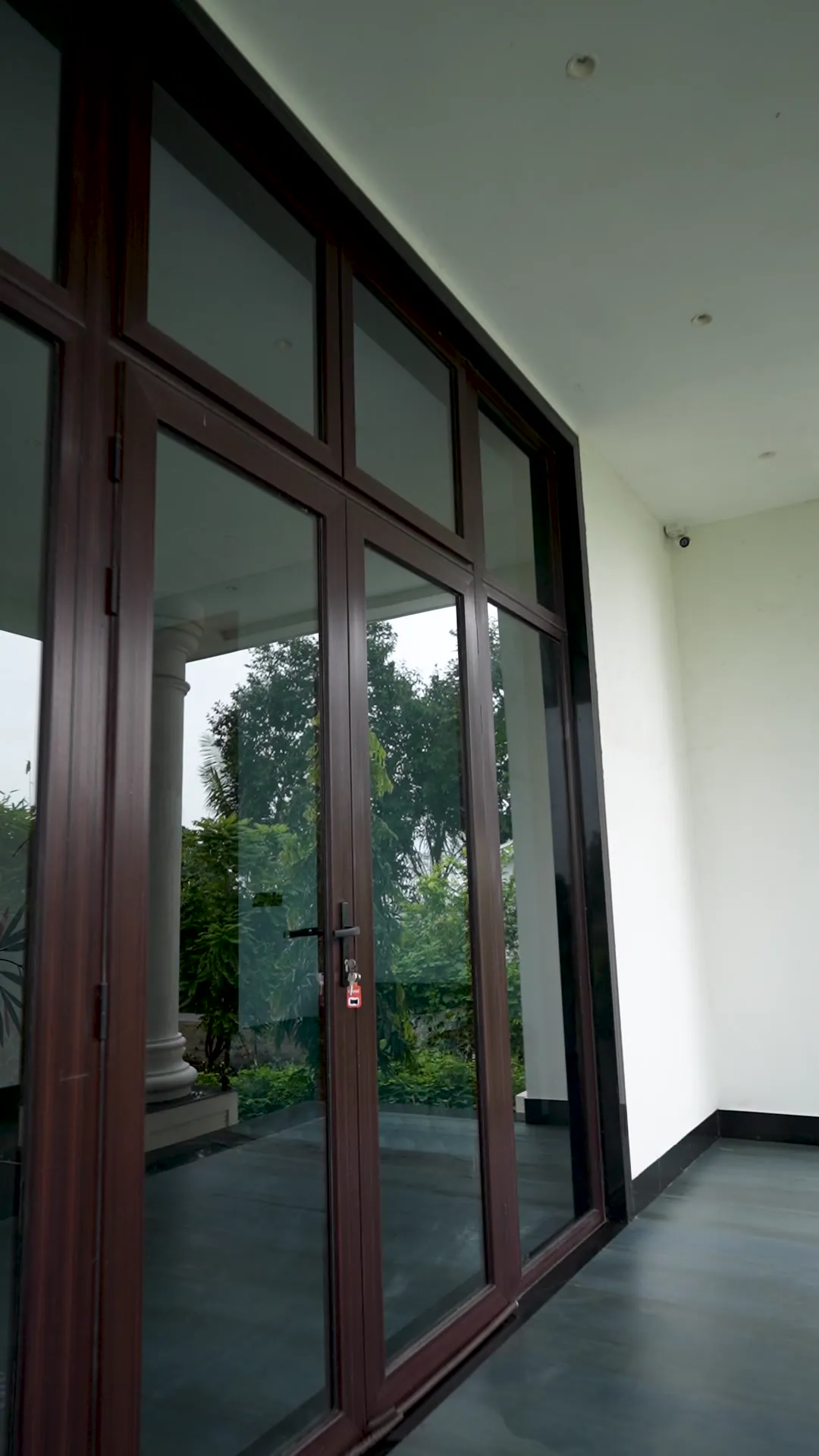 Luxury Villa with Arched Windows by Rudratech — uPVC installation detail 6